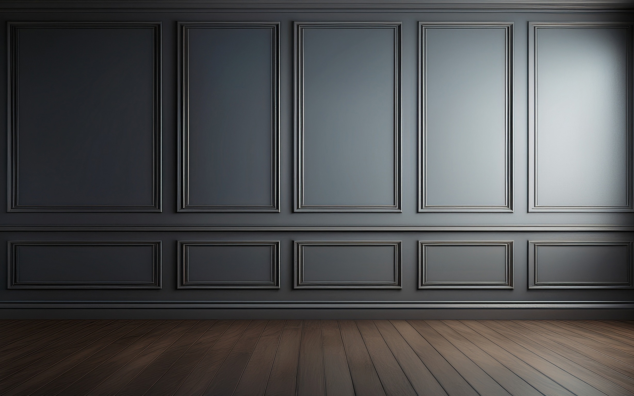 Empty paneled room with wood floors